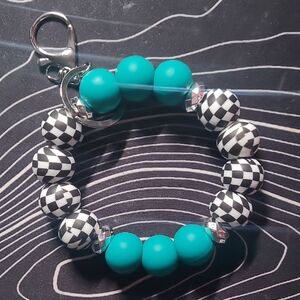 Turquoise and Checkered Wristlet